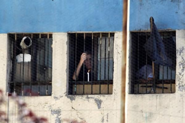 Čilėje per gaisrą kalėjime žuvo mažiausiai 81 žmogus
