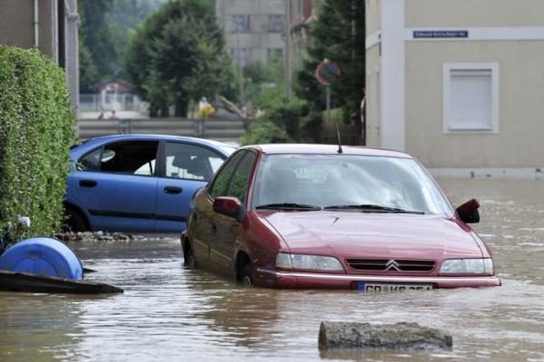 Liūtys ir potvyniai vėl užklupo Lenkiją ir jos kaimynes