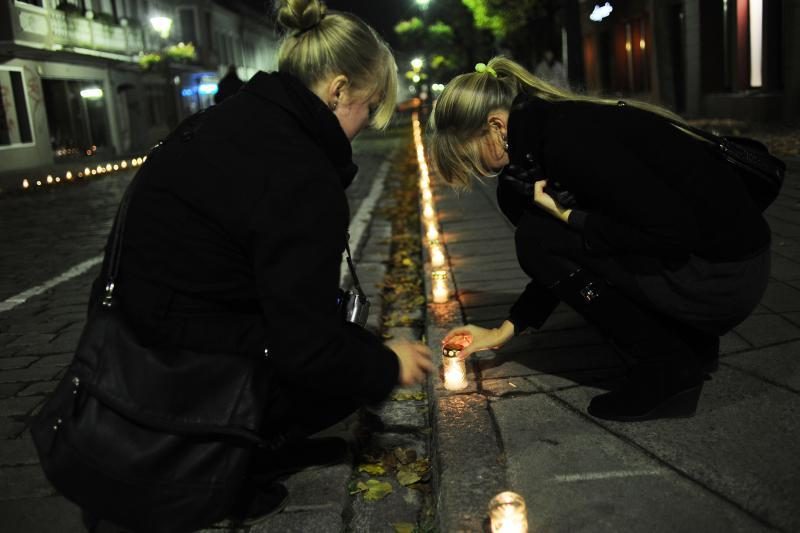 Tūkstančiai studentų žvakelių – išėjusiesiems