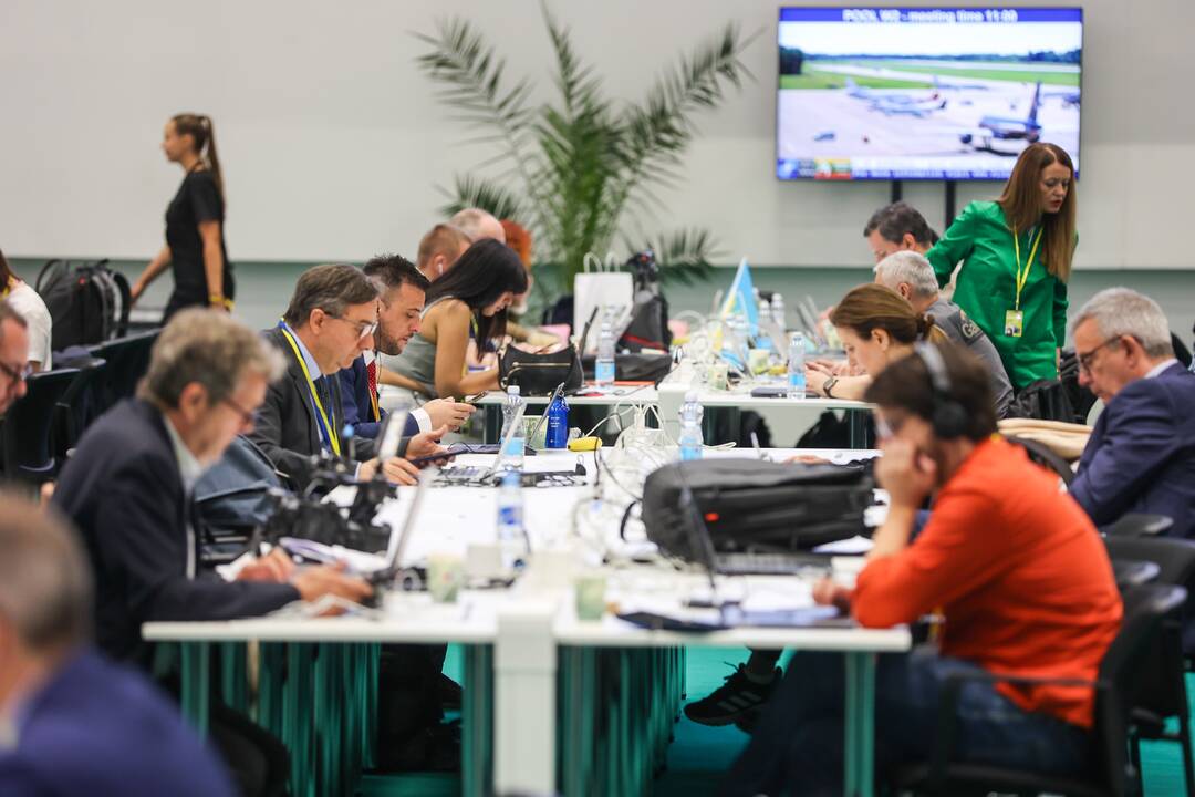 NATO viršūnių susitikimo spaudos centro užkulisiai
