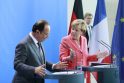 Francois Hollande ir Angela Merkel