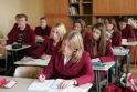 Tyrimas: mergaitės ypač lenkia berniukus per lietuvių kalbos pamokas