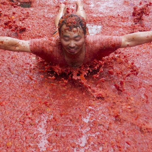 Festivalis „Tomatina“ Ispanijoje  © Scanpix nuotr.