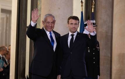 Benjaminas Netanyahas (kairėje) ir Emmanuelis Macronas.