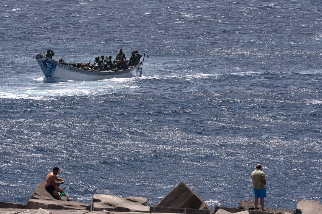 Migrantai.