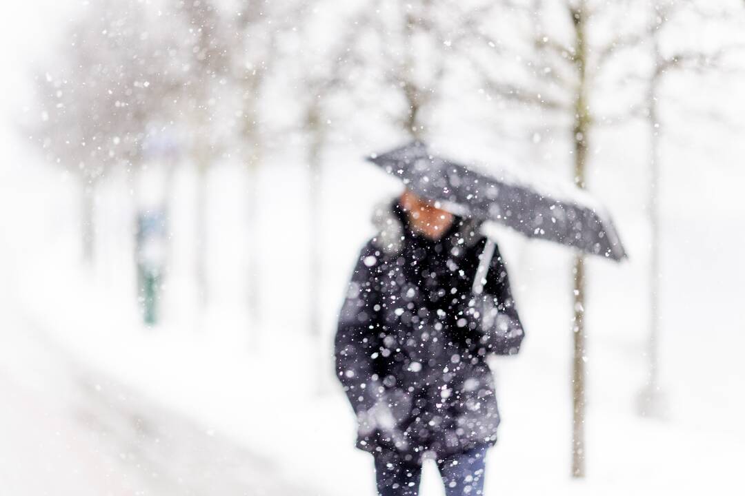 Lietuvoje eismo sąlygas sunkino gausūs krituliai