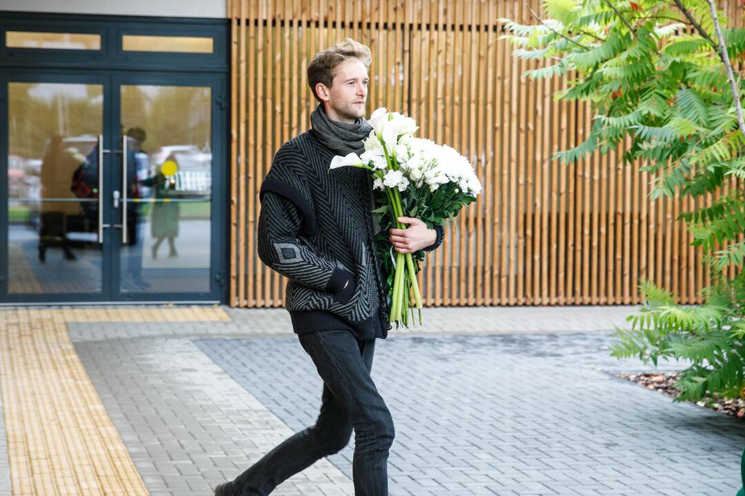 Fotomenininko R. Rakausko laidotuvės