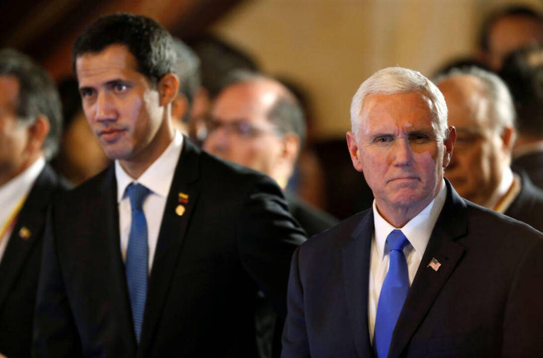 Juanas Guaido ir Mike'as Pence'as