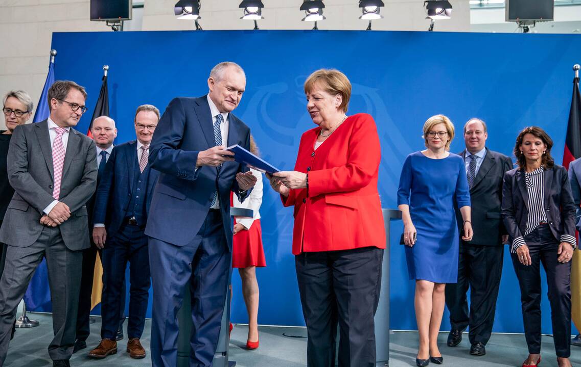 Christophas Schmidtas ir Angela Merkel