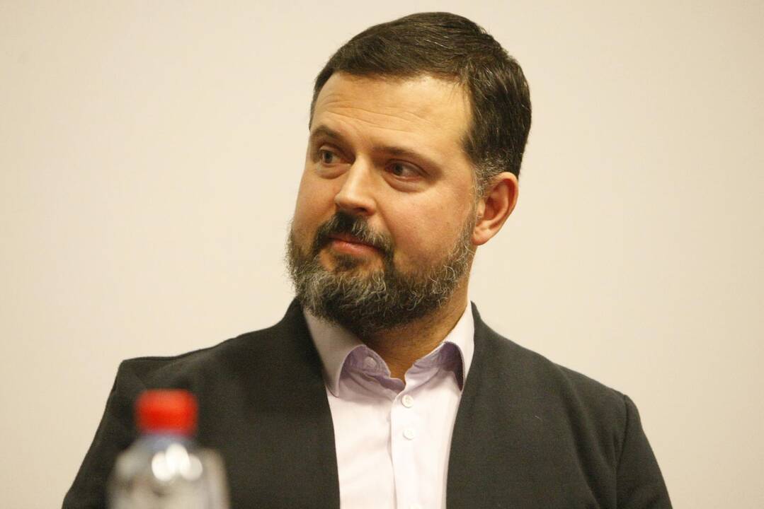 Emocijos: salėje sėdėję žmonės į svečių kalbas reagavo skirtingai.
