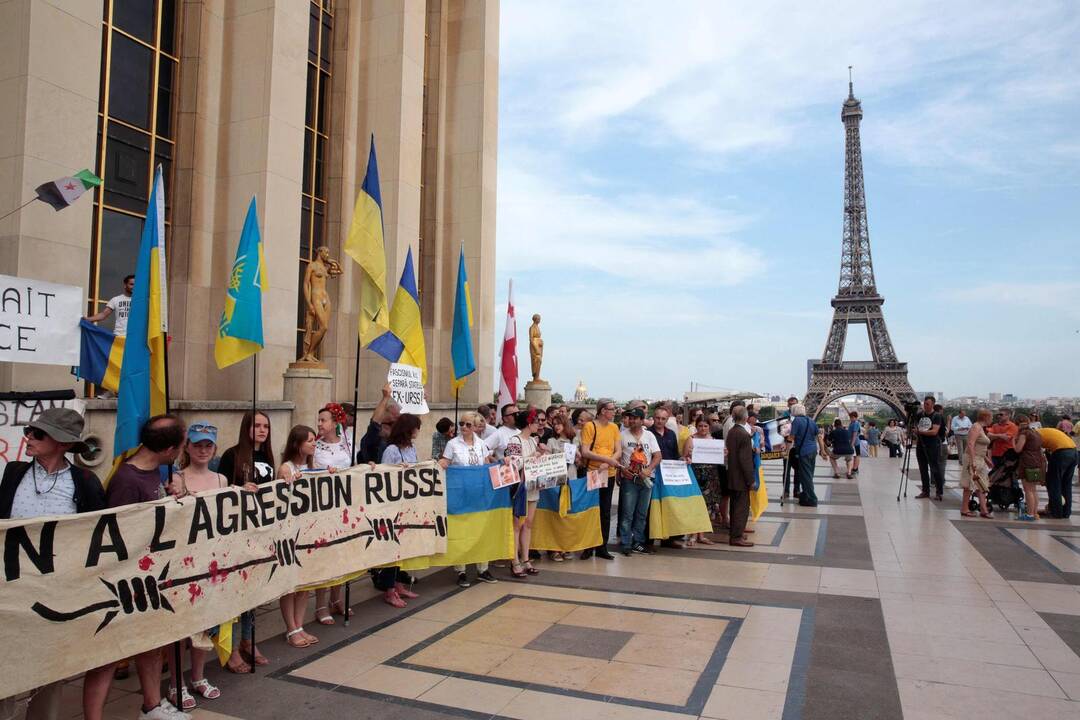 Emanuelis Macronas ir Vladimiras Putinas
