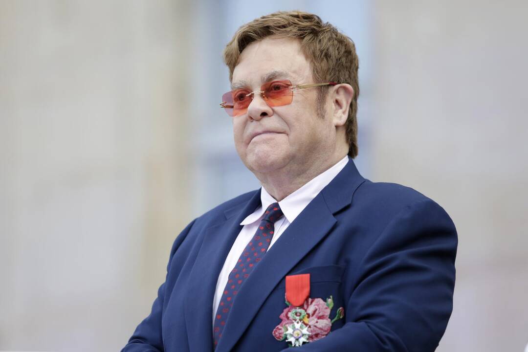 Eltonas Johnas ir Emmanuelis Macronas