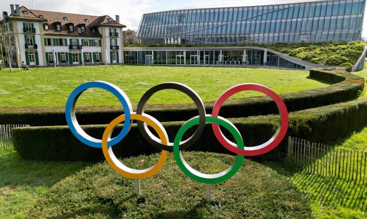 TOK: rusų, baltarusių sportininkai nedalyvaus olimpinių žaidynių atidarymo ceremonijoje 