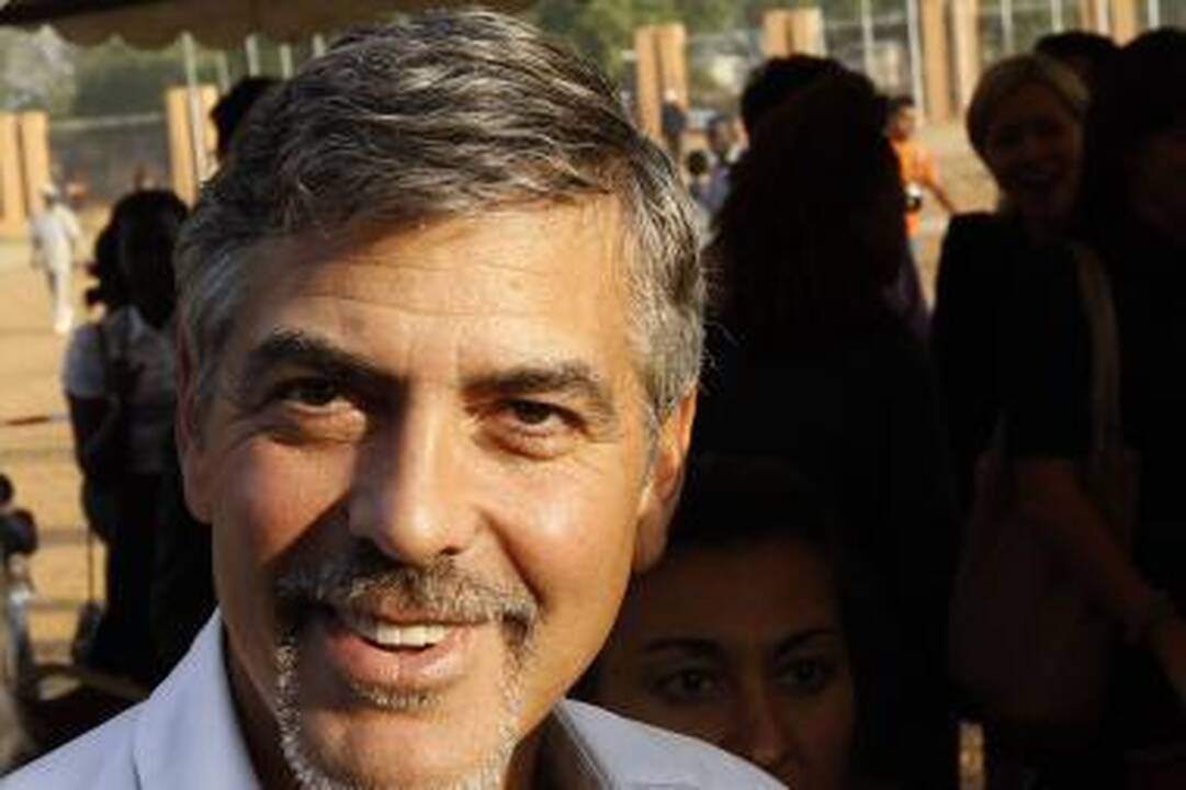 Aktorius G.Clooney gali būti iškviestas duoti parodymų S.Berlusconi teismo procese