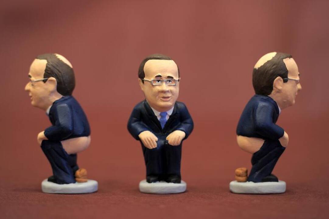 Ispanijoje pardavinėjamos besituštinančio F. Hollande'o statulėlės