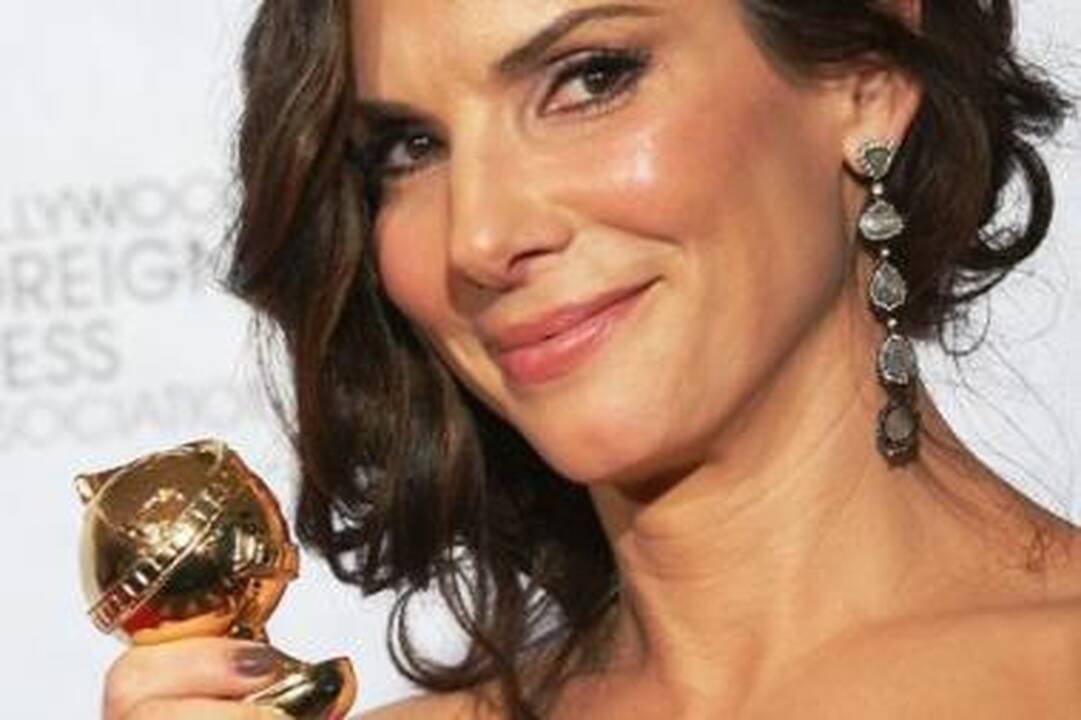 Holivudo žvaigždė S.Bullock pelnė "Auksinį gaublį"