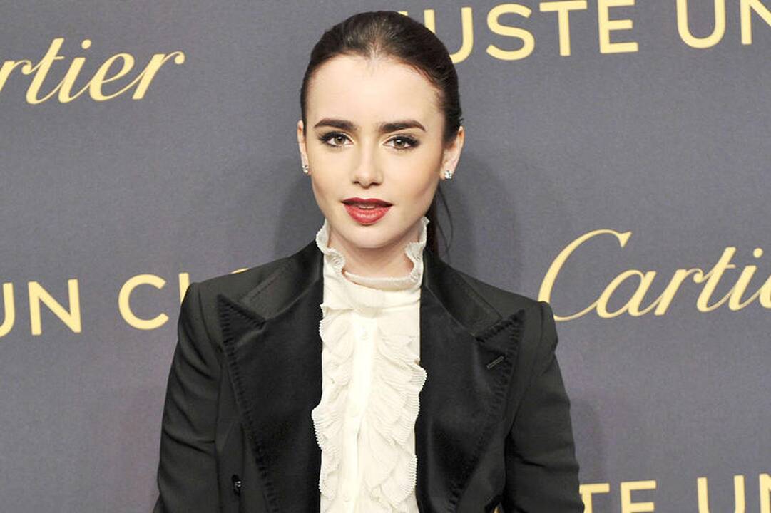 Philo Collinso dukra Lily seka tėčio pėdomis?
