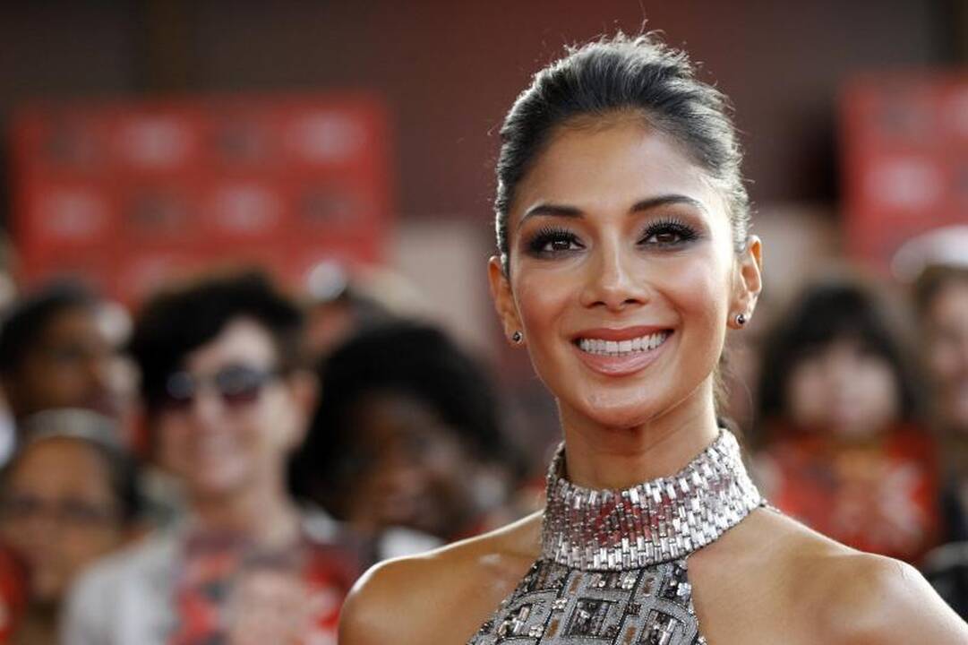 N.Scherzinger prisipažino tebemylinti L.Hamiltoną