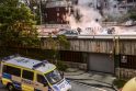 Dėl riaušių Stokholmo priemiestyje sulaikyti septyni asmenys