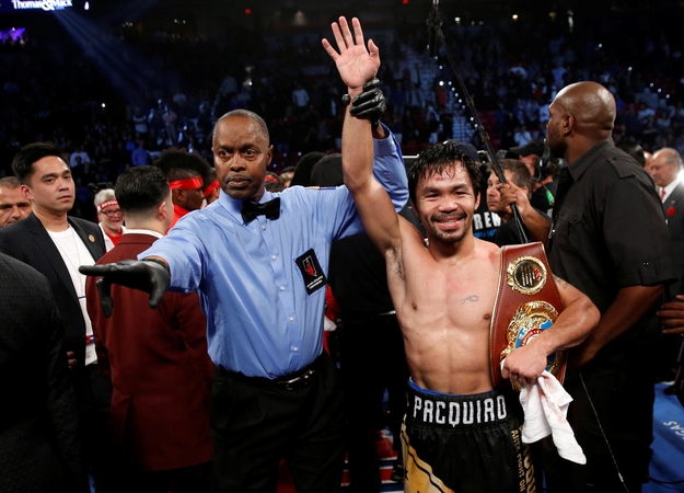 Gyva bokso legenda M. Pacquiao pelnė pasaulio čempiono titulą