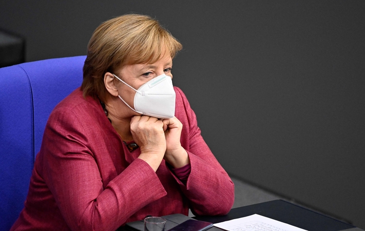 A. Merkel perspėja dėl sąmokslo teorijų grėsmės kovoje su koronavirusu