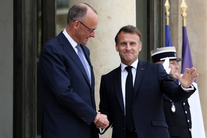 Friedrichas Merzas ir Emmanuelis Macronas