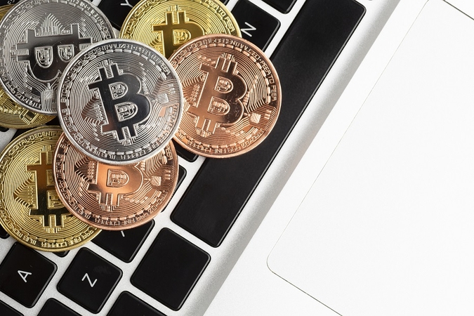 Seime skinasi kelią siūlymas kripto įmonių licencijas suteikti iki metų pabaigos