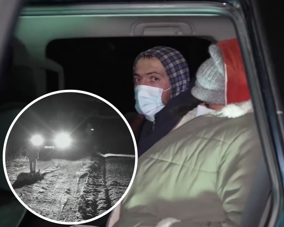 Užfiksavo prie sienos atvežtus migrantus: pamatę pasieniečius, jie nusiavė batus (vaizdo įrašas)