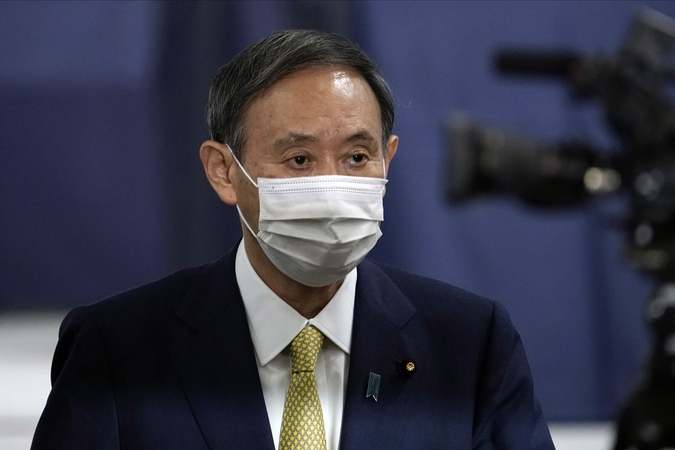Japonijos valdančioji partija Sh. Abe įpėdiniu išrinko Y. Sugą
