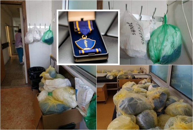 A. Veryga medaliu apdovanojo A. Naudžiūną, kurį premjeras ragino atleisti