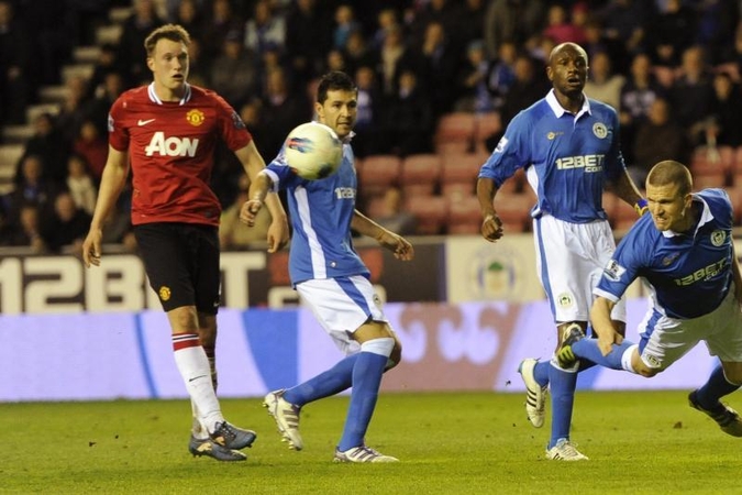„Manchester United“ nusiledo „Wigan Athletic“