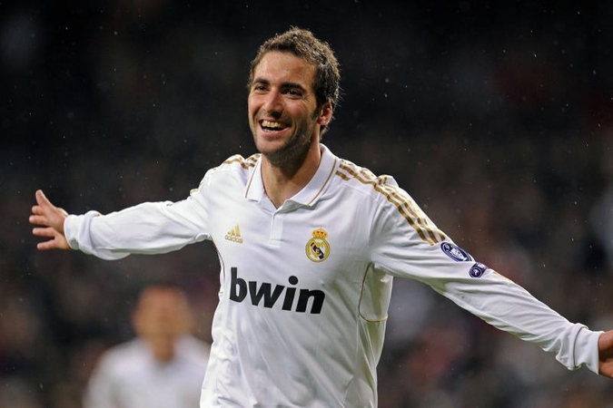 G.Higuainas patenkintas žaidimu su K.Benzema