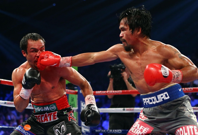 Įspūdingoje bokso kovoje Juanas Manuelis nokautavo Manny Pacquiao